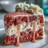 A festive Bridal Shower Rosé Velvet Cake, adorned with delicate frosting and shimmering gold accents.