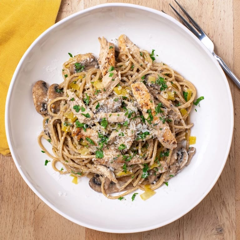 Creamy Mushroom Chicken Spaghettini served hot, with skinny pasta ribbons and juicy chicken slices tossed in a rich mushroom sauce.